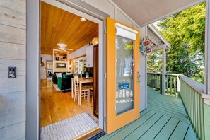 Outdoor dining - Charming coastal home with water views, large covered deck (Gold Beach)