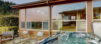 Oceanfront home with private hot tub, walls of glass & spectacular view