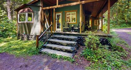 Cozy Riverfront Cottage with Charming Interior & Hot Tub - Dog-Friendly