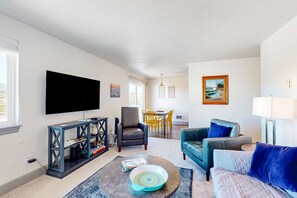 TV, offices - Updated condo with river view, convenient location, & private balcony (Seaside)