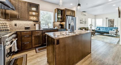 Sunny apt with fireplace, partial water views, washer/dryer, grill & AC