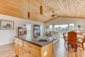 TV, fireplace, offices - Serene riverfront home with gas fireplace, W/D, balcony, patio, & board games (Seaside)