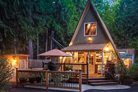 Exterior. Adorable A-frame cabin withnearby river access, game room, wood stove, firepit