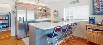 Dog-friendly home with two full kitchens & a gas grill - walk to the ocean