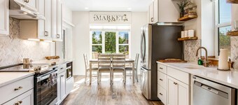 Modern cottage with covered deck, grill & fireplace - walk to beach-bars-dining