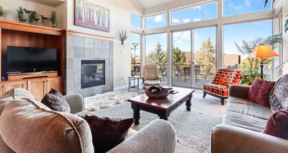 Vibrant home with fireplace, large balcony & access to indoor-outdoor pools