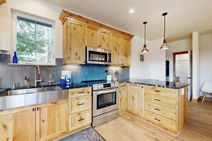 Fridge, microwave, oven, stovetop - Quaint second floor home one mile from the ocean; with full kitchen & W/D (Manzanita)