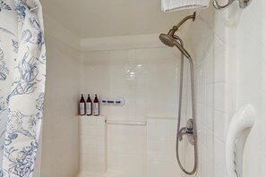 Shower, hair dryer, towels