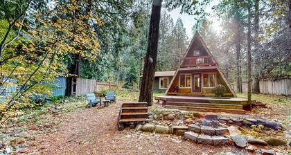 Dog-friendly A-frame near the river with game room, firepit, wood stove, & grill