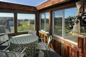 Outdoor dining - Ocean view 70s-themed home with beach access, grill, funky interior, & W&D (Bandon)
