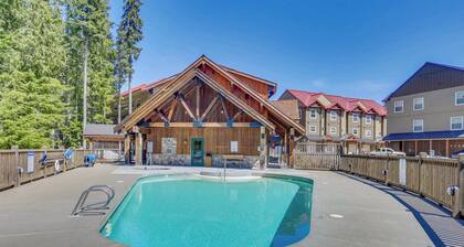 Riverfront mountain townhouse with pool & hot tub, patio, & easy ski access