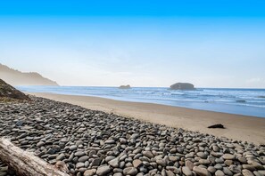 On the beach - Secluded beachfront home with Pacific Ocean views, fireplace, game room, grill (Arch Cape)