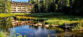 Luxury mountain home withshared pool & hot tub, patio, balcony views, & free WiFi