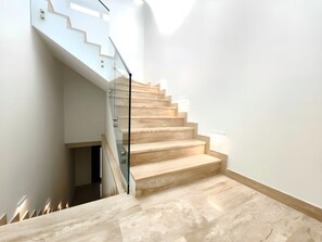 A modern staircase with glass railings and wooden steps. - Luxury Villa Admiria Split - Heated Indoor Pool & Stunning Terrace (Split)