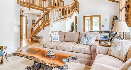 Modern, spacious getaway with private hot tub, wood fireplace, WiFi, & game room