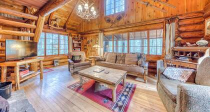 Historic riverfront Steiner cabin in forest with firepit, deck, & patio lounging