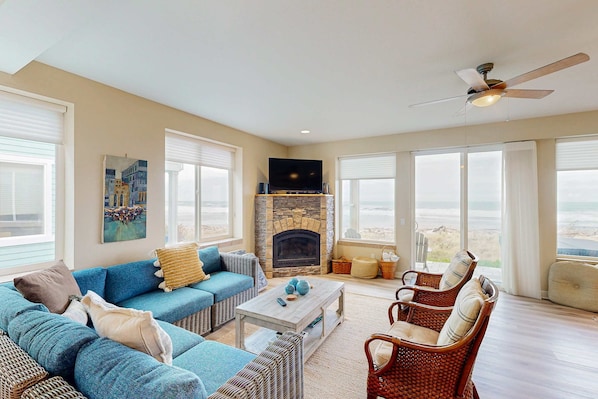 TV, fireplace, offices - Modern oceanfront home with private hot tub, patio, & gas fireplace (Gold Beach)