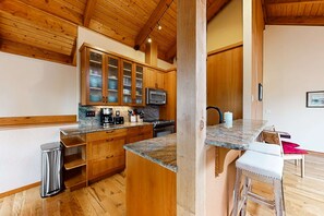 Fridge, microwave, oven, stovetop - Tree-lined coastal home with wood fireplace, yard, W&D, & games - dog-friendly (Manzanita)