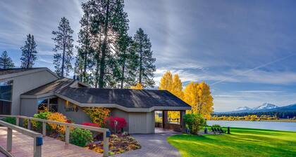 Resort home with pool, hot tub, three-tier decks, & golf course views