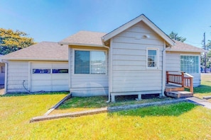 A single-story house with a front porch and a garage.