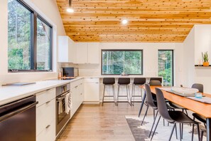 Fridge, microwave, oven, stovetop - Sleek, Modern Home in Town with Forest Views, Fire Table, WiFi - Walk to Skiing (Government Camp)