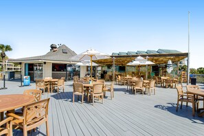 Outdoor dining - Beach resort condo with marsh-view balcony, pool, tennis, gym, & beach access (Hilton Head)
