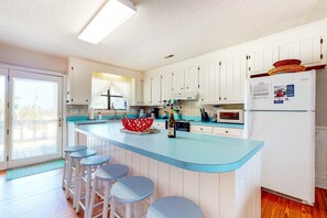 Fridge, microwave, oven, stovetop - Dog-friendly duplex with sound views, screened porch, WiFi and dock (Edisto Beach)