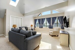 TV, offices - Second-row beach house with ocean views, central AC, & washer/dryer (Edisto Beach)