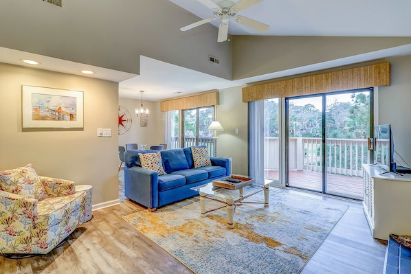 TV, fireplace, offices - Welcoming Condo with Lagoon Views, Deck, Shared Pool & Nearby Beach Access (Hilton Head)