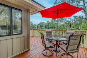 Outdoor dining - Welcoming Condo with Lagoon Views, Deck, Shared Pool & Nearby Beach Access (Hilton Head)