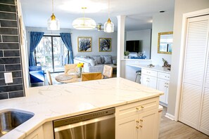 Interior - Golf course adjacent, beach-themed condo with sunroom, washer/dryer, & AC (Edisto Beach)