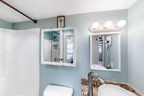 Shower, hair dryer, towels