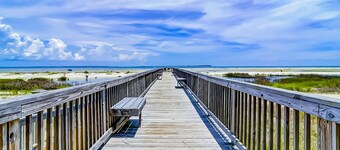 Second-floor condo in beachfront complex with pools, tennis & gym