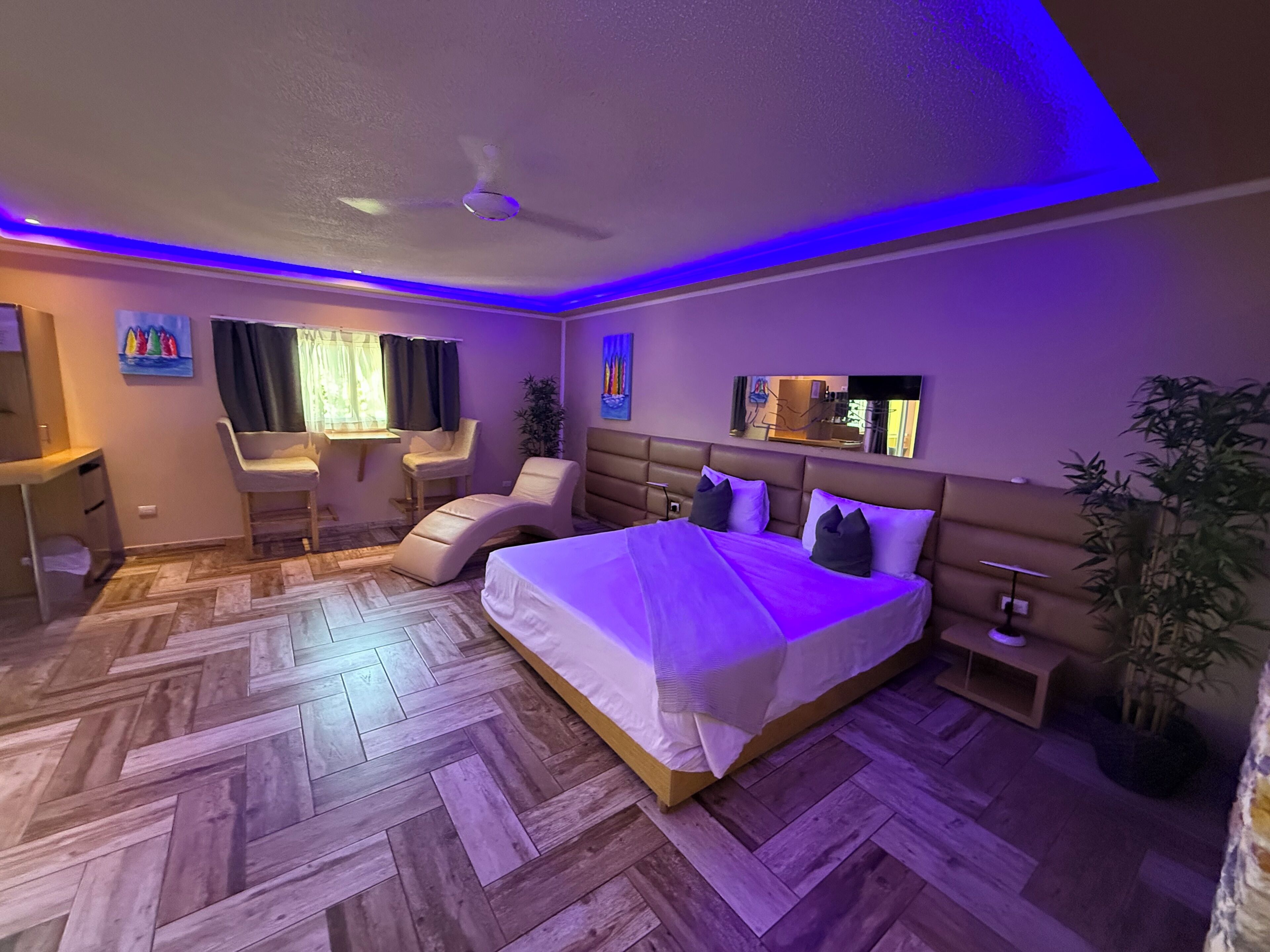Deluxe Room, 1 King Bed, Balcony, Courtyard View | In-room safe, blackout drapes, soundproofing, iron/ironing board