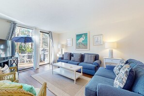 TV, offices - Coastal condo with private grill and shared pool, nearby beach access (Hilton Head)