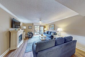 TV, fireplace - Tropical Condo with Pool, Hot Tub, Lagoon Views from Balcony - Beach Access (Hilton Head)