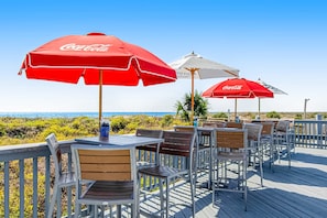 Outdoor dining - 1st-floor condo near the beach with pool, tennis, balcony, gym, streaming, W/D (Hilton Head)
