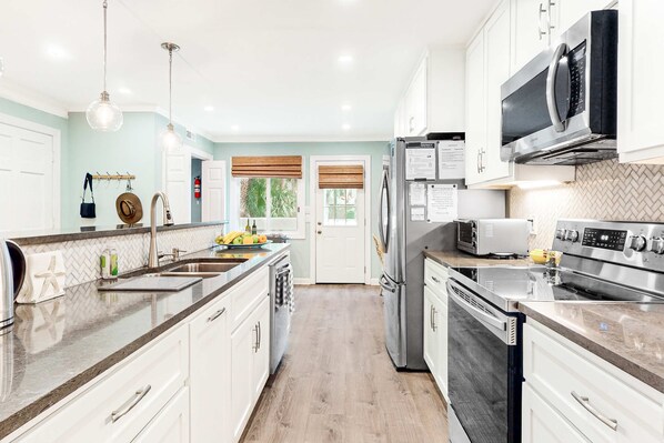 Fridge, microwave, oven, stovetop - Bright & Beachy Dog-Friendly Villa w/ Fast WiFi, Central A/C, & a Shared Pool (Hilton Head)