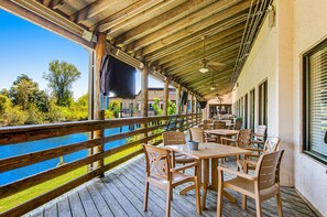 Outdoor dining - 1st floor condo with  balcony, pools, tennis & close to beach (Hilton Head)