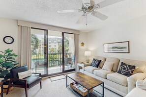 TV, DVD player - Bright Condo with Full Kitchen, Shared Pools, Hot Tub, Beach Access, and More (Hilton Head)