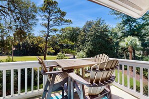 Outdoor dining - Second-Floor Condo w/Free WiFi, Shared Pool, Hot Tub, Balcony, Golf Course View (Hilton Head)