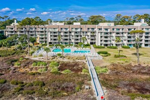 Exterior - 4th-floor villa with balcony, beach access, outdoor pool, & grills (Hilton Head)