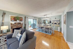 TV, fireplace, offices - Relaxing Coastal Escape- Golf course view with shared pool, nearby beach access, and serene island charm (Hilton Head)