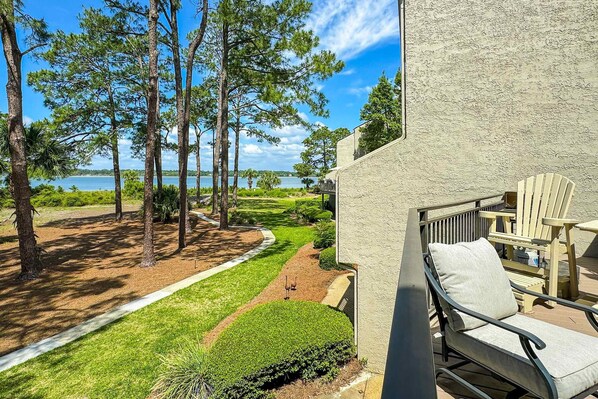 Terrace/patio - Spacious waterview haven with decks, firepit, AC, WiFi, pool - walk to beach (Hilton Head)