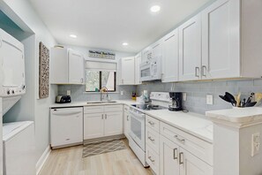Fridge, microwave, oven, stovetop - Coastal-Chic Poolside Home w/ Large Balcony, Lagoon Views & Beach Access (Hilton Head)