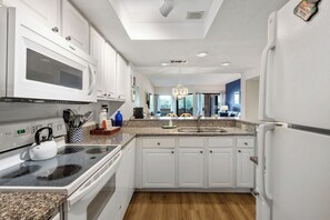 Fridge, microwave, oven, stovetop - Waterfront condo with walkable locale, central AC, washer/dryer, & shared pool (Hilton Head)
