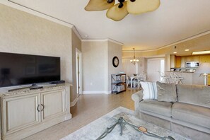 TV, DVD player, offices - Bright & Airy Retreat with Balcony Views, Walkable Beach Access & Central Location (Hilton Head)