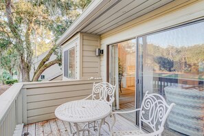 Outdoor dining - Snowbird-Friendly Condo with Golf View, Patio, Shared Pool/Tennis, A/C, WiFi (Hilton Head)
