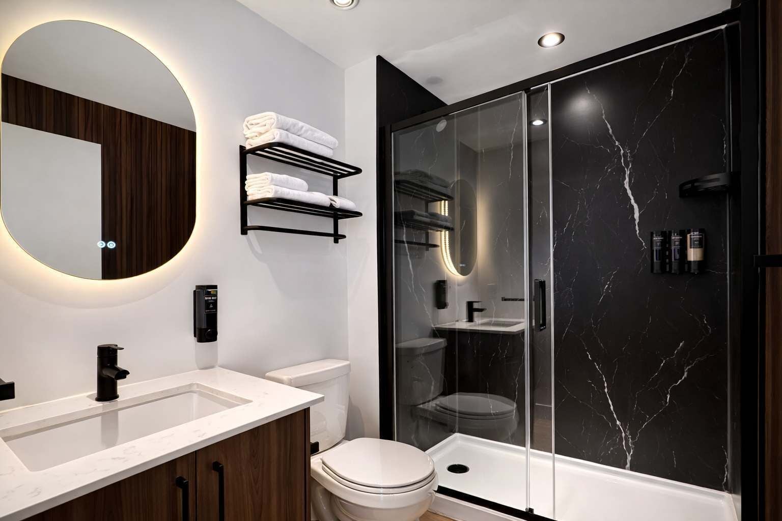 Shower, hair dryer, towels, shampoo