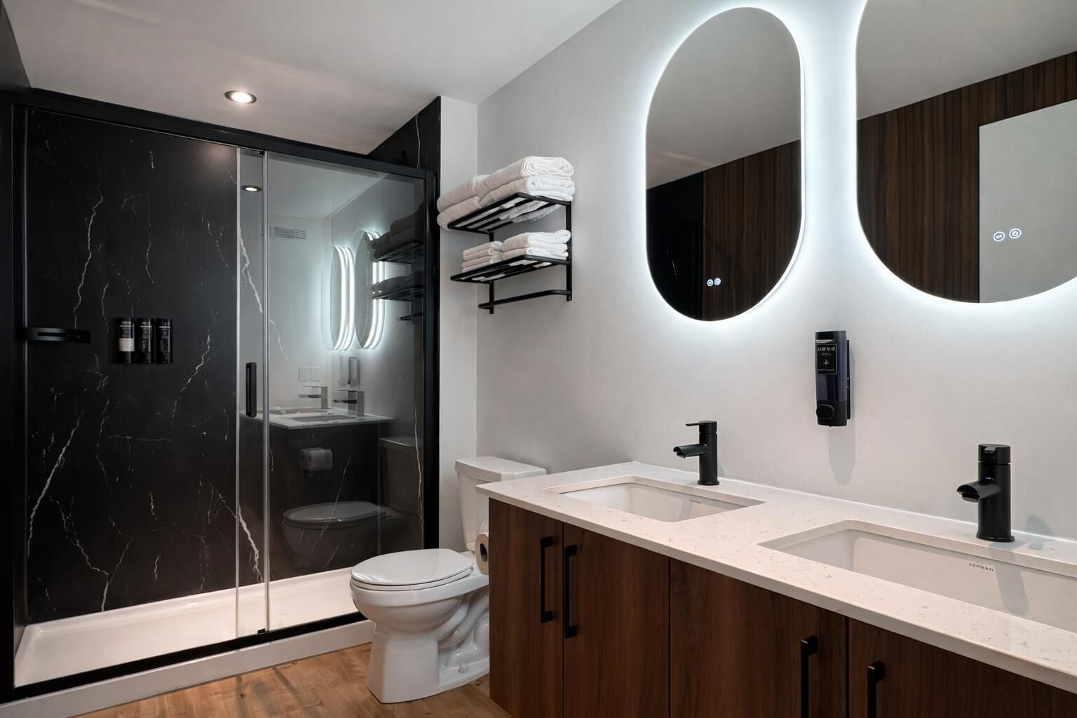 Shower, hair dryer, towels, shampoo